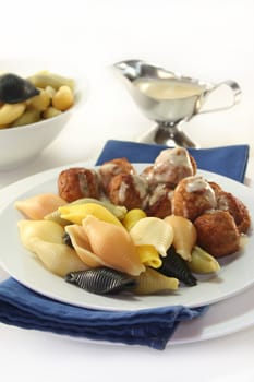 Swedish meatballs with noodles and radish-cucumber salad