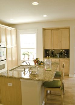 modern kitchen with light colored cabinets