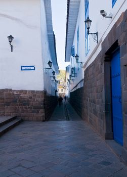 Old narrow street in the center of Cusco Peru