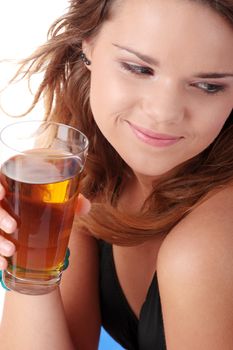 Young woman in bikini drinking ice tea isolated