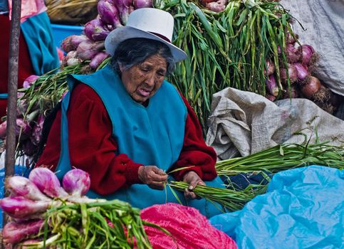 Cusco , Peru - May 27 : Peruvian woman in a market in Cusco Peru , May 27 2011