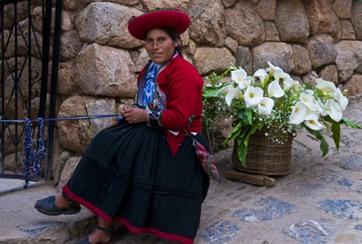 Cusco , Peru - May 27 : Peruvian woman in a market in Cusco Peru , May 27 2011