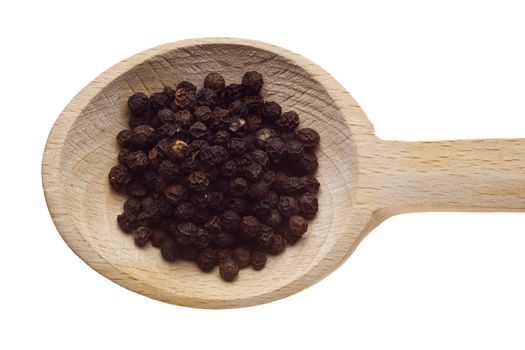 Herbs and spices on wooden spoons - pepper