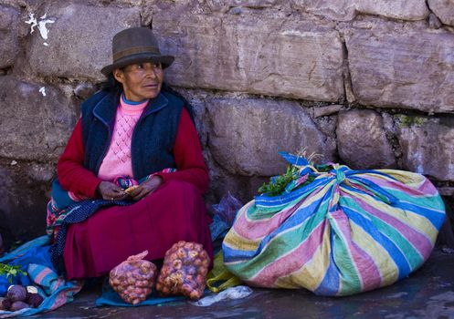 Cusco , Peru - May 27 : Peruvian woman in a market in Cusco Peru , May 27 2011