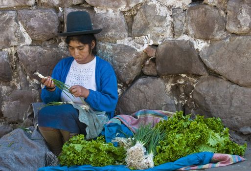 Cusco , Peru - May 27 : Peruvian woman in a market in Cusco Peru , May 27 2011