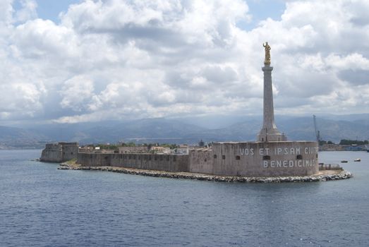 the harbor entrance of Messina with the typical statue