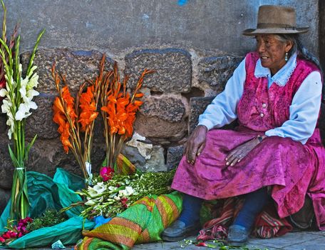 Cusco , Peru - May 27 : Peruvian woman in a market in Cusco Peru , May 27 2011