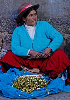 Cusco , Peru - May 27 : Peruvian woman in a market in Cusco Peru , May 27 2011