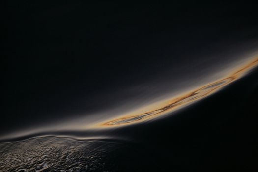abstract reflection of sunset in water wave