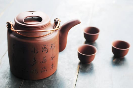Traditional Chinese tea set on an old table