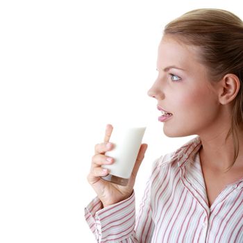 Young happy woman drinking milk isolated on white background