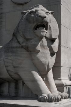 lion cement statue at toronto lakeshore park