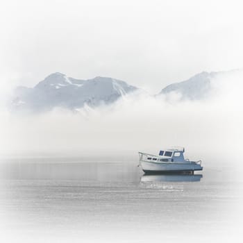 A Boat with Mountains and Clouds