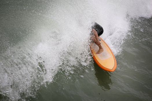 surfer caught by a wave in california