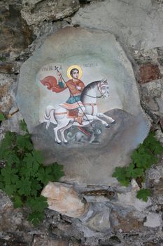 icon of Saint George painted on stone 