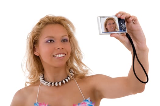 Beautiful blond woman taking a picture of herself
