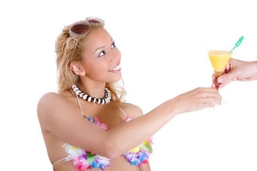 Beautiful blond woman in beachwear getting a cocktail