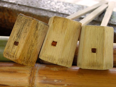 Bamboo ladles on a Japanese fountain-close-up          