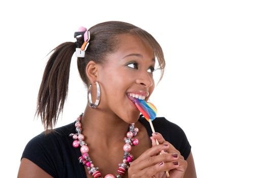 Cute black girl eating a lollipop