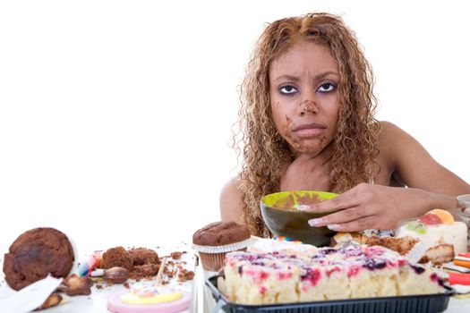 Pretty black girl feeling very ill after having eaten too much sweets