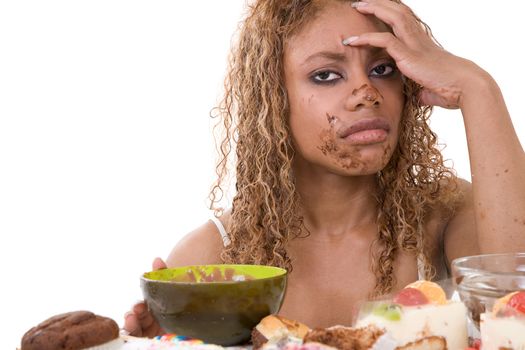 Pretty black woman looking very sick after having eating too much