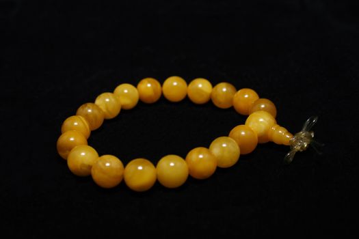 Buddhist praying item make by amber, similar to rosary in Catholic.