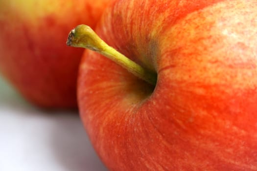 Close-up of red fresh apples on a white background