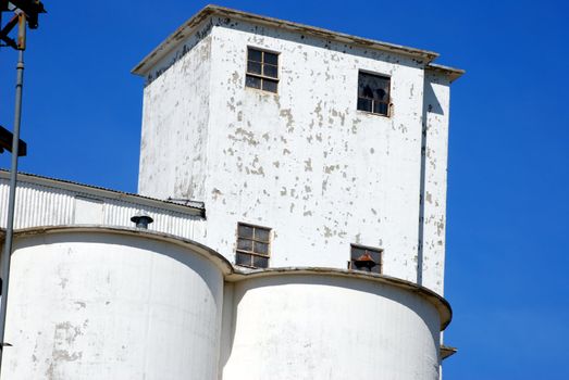 Part of an old factory with peeling paint.