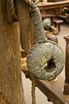 An old rope and wooden block pulleys of an old pirate ship