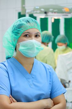 asian female confident o.r. nurse