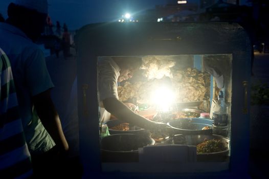 Colombo,Sri Lanka - February 22,2011: Traditional fast food on the embankment of Colombo