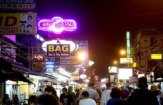 Bangkok, Thailand - March 25, 2011: Tourists walking by  Khao San Road. Khao San Road is a mecca for backpackers. It has everything a backpacker could want.