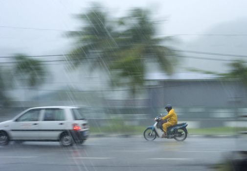 Kedah, Malaysia - March 28, 2011: Traffic in the heavy rainfall in Malaysia