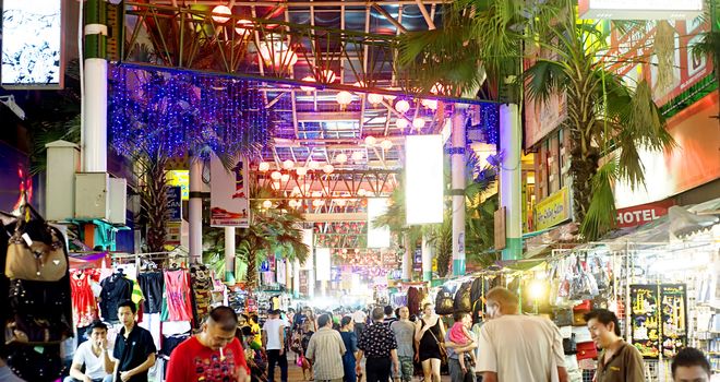 Kuala Lumpur, Malaysia - March 30, 2011: Petaling Street or known as Chinatown among tourists is the centre of Kuala Lumpur's original Chinatown. The street is also affectionately known as PS among locals
