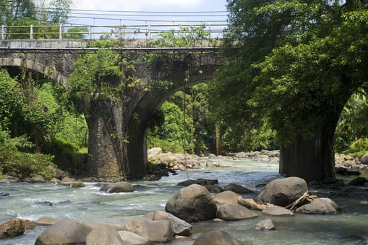 Bridge across the mountain river on Bali island, Indonesia
