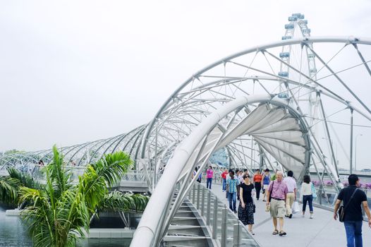 Singapore ,Republic of Singapore - May 2, 2011: The Helix Bridge , previously known as the Double Helix Bridge , is a pedestrian bridge linking Marina Centre with Marina South in the Marina Bay area in Singapore