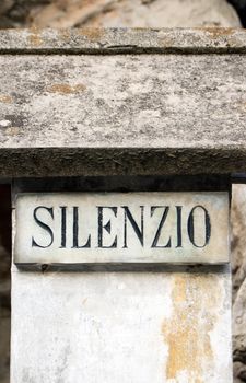 a tablet with an Italian inscription SILENZIO (silence)