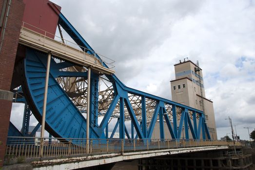 A Blue Girder Lift Bridge over a river in Yorkshire England
