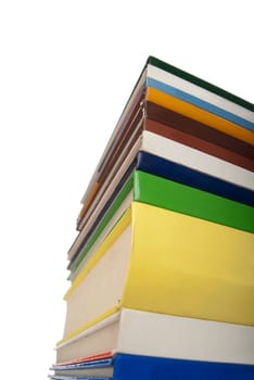 Books stacked one over the other isolated on white