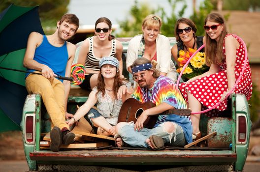 Groovy Group in the Back of Truck Smiling