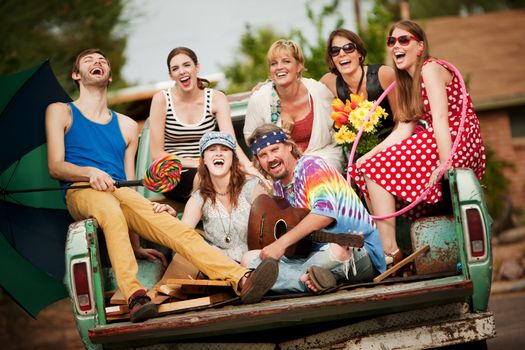 Groovy Group in the Back of Truck Laughing