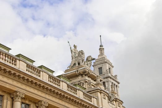 An ornate Statue of a Regal Woman and Lions on a historic building in Yorkshire