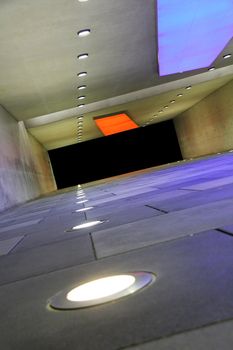 colored corridor with lights in the floor