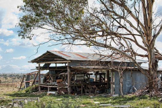 old farm shed neglected and in falling apart