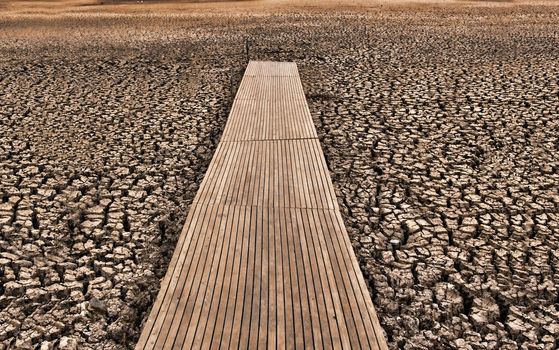 great image of a pontoon or jetty on a dry cracked lake bed