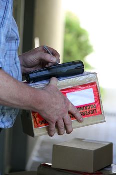 Parcel delivery with hand signature on handheld computer
