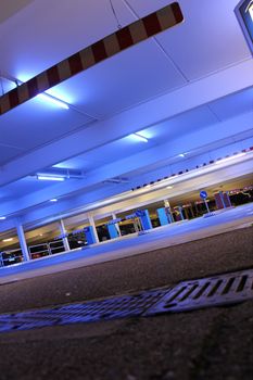 parking garage with bright neon lights at night