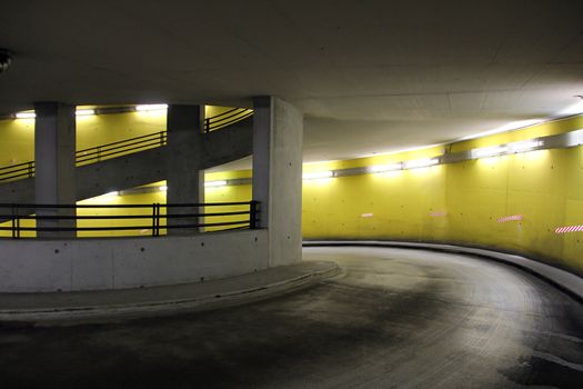 parking garage with bright neon lights at night