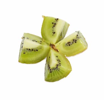 A kiwi fruit sliced open so the seeds are visible 