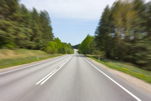 road speed, blurred in motion